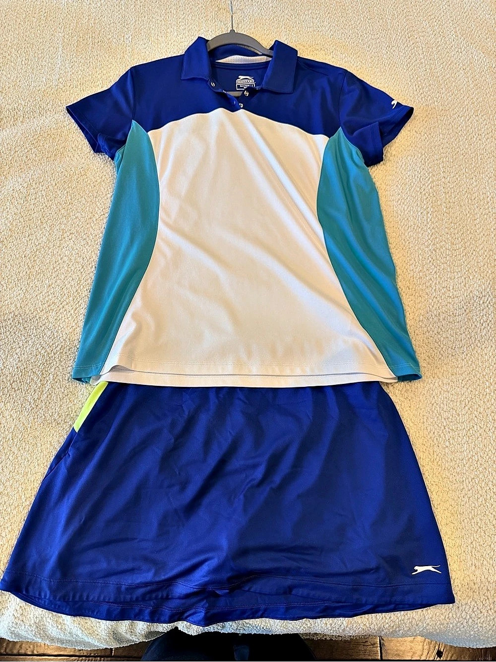 Slazenger Women’s Golf set. Shirt is a Large and skort is a Medium.